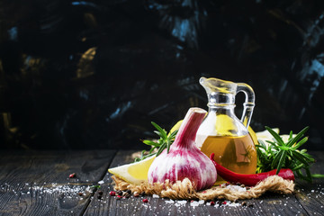 Selection of spices and seasonings with garlic, butter, lemon, selective focus