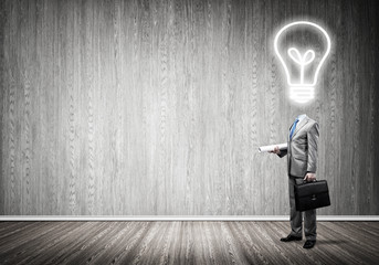 Obraz premium Bulb headed businessman