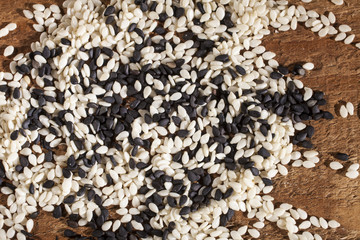 Background of fresh black and white sesame seeds