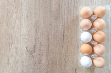 Happy Easter on wooden table