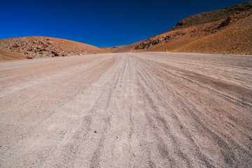 Fototapeta na wymiar Corrugated road in Altiplano