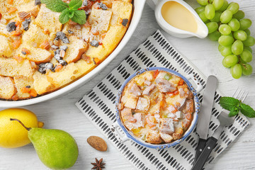 Freshly baked bread pudding in casserole dishes on table