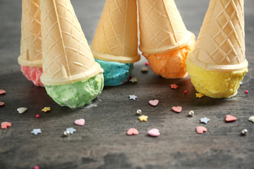 Ice-cream cones on gray table