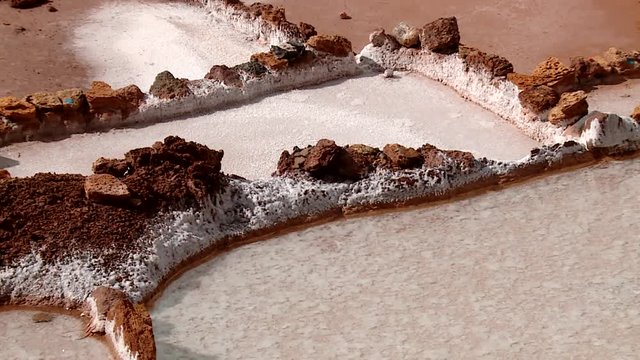 SALT MINING: video footage from Maras, Peru. Region of Cusco in andean landscape in South America, Peru.