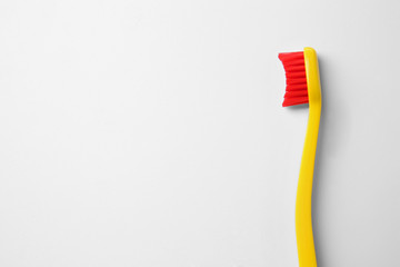 New toothbrush on white background