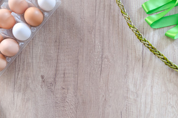 Happy Easter on wooden table