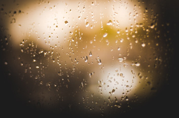 Rainy days,Rain drops on window,rainy weather,rain background,rain and bokeh