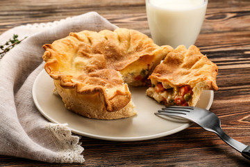 Delicious chicken pot pie on plate, closeup