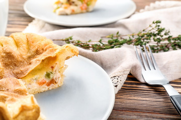 Delicious chicken pot pie on plate, closeup