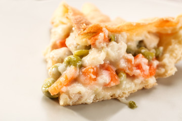 Delicious chicken pot pie on plate, closeup