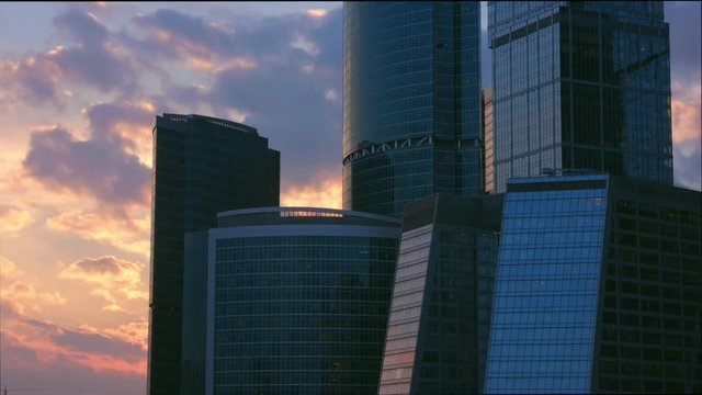 Time lapse business district at sunset