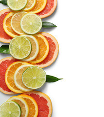Fresh slices of citrus fruits on white background