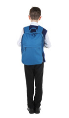Incorrect posture concept. Cute schoolboy with backpack on white background