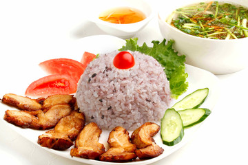 Vietnamese lunch set of rice with fried pork and soup