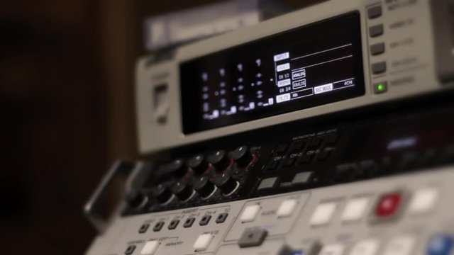 Old Analog tape to digital converter in film studio
