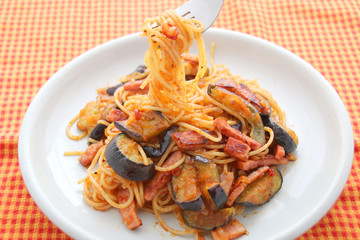 Pasta noodle with eggplant on white dish