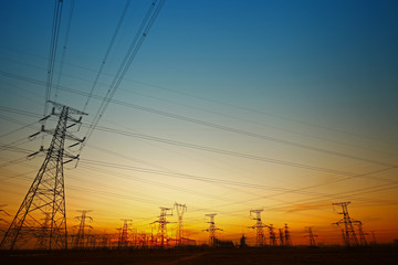 Fototapeta premium Wire electrical energy at sunset
