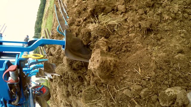 (  ) &ndash; on-board-camera on a plought of a tractor on a acre