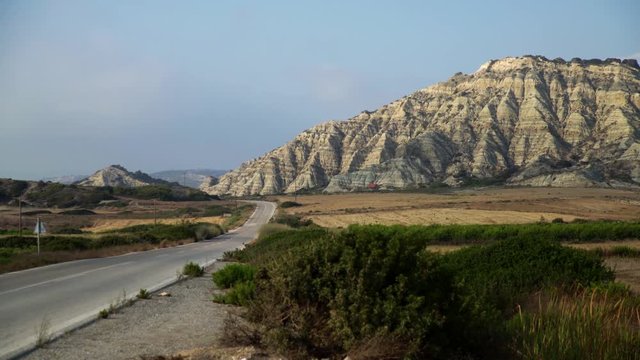 Contry Road in a nice landscape (Rhodes, Greece). 