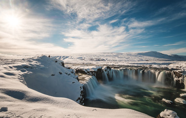 Landscaped, Godafoss water fall at winter in Iceland with bright sunlight
