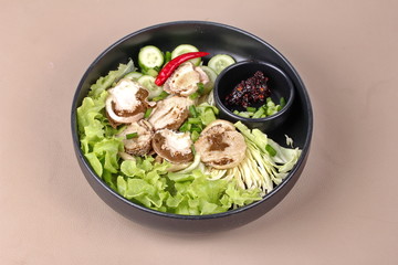 Boiled fresh bamboo mushroom and vegetable with roasted chili dip.