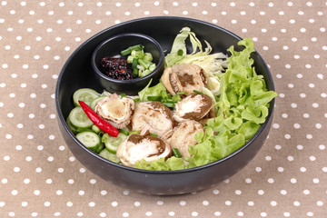 Boiled fresh bamboo mushroom and vegetable with roasted chili dip.