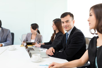 Group of business people in meeting room