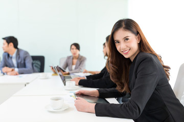 Asian business woman in conference room