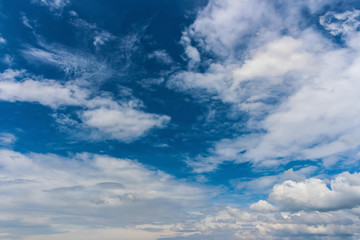 White fluffy clouds in the blue sky
