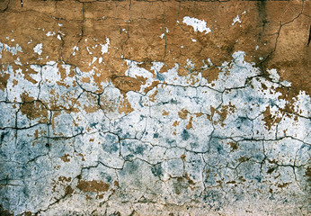 Background of stone wall texture. ocher Old cracked plaster
