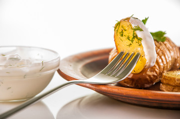 potatoes with salt pepper and cumin sauce. Roasted potato wedges crispy delicious