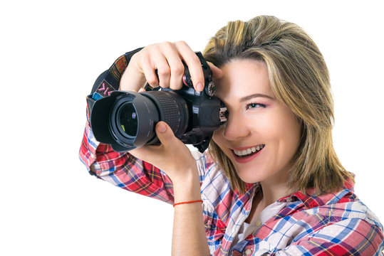 Beautiful Girl photographer. Girl with camera on white background. The girl takes pictures, hobbies like making money. modern youth