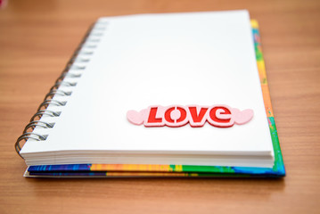 Opened notepad with word Love
