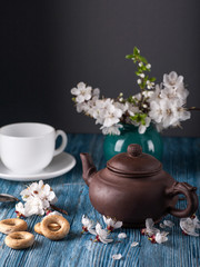 Chinese teapot and flowers apricots