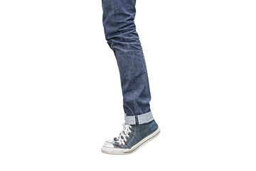Fototapeta na wymiar Regular Fit Straight Leg Jeans and Retro Canvas High Top Sneakers isolated on white background, selective focus (detailed close-up shot)