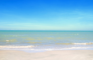 Fototapeta na wymiar Wave & Sand beach with blue sky background 