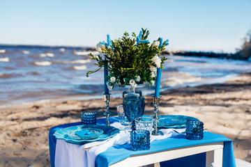 Fototapeta na wymiar Table decor and blue tableware