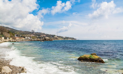 Sea shore with rocks and surf