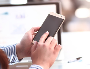 Close up of a man using mobile smart phone