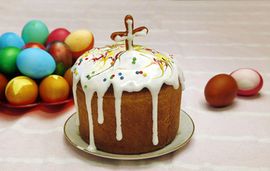 Still life with Nice colorful Easter eggs and traditional Easter cakes