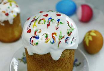 Still life with Nice colorful Easter eggs and traditional Easter cakes with text 