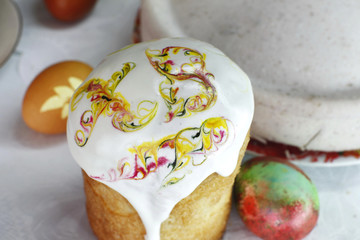 Still life with Nice colorful Easter eggs and traditional Easter cakes
