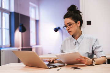 Young girl looking for a job online