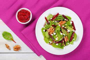 caramelized walnuts salad on white plate