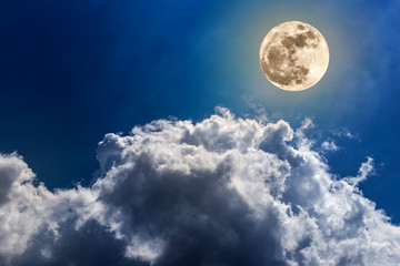 Naklejka na ściany i meble Beautiful Night sky and a full moon in the clouds