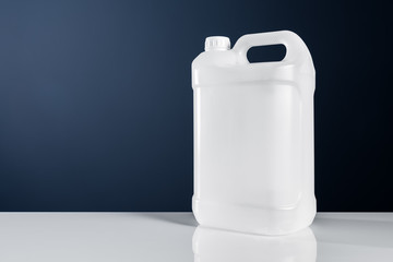 Unlabeled white plastic tank canister chemical liquid container