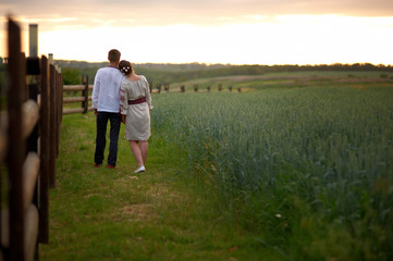 Young lovely couple embracing outdoors