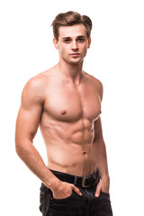 Fototapeta premium Well built shirtless muscular male model against white background