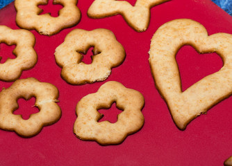 Delicious cookies on red table.