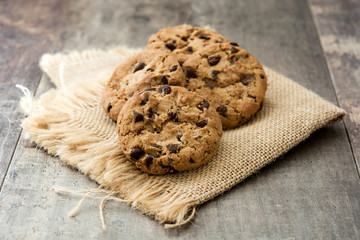 Chocolate chip cookies on wooden table background
